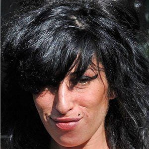 Amy Winehouse Headshot 8 of 9