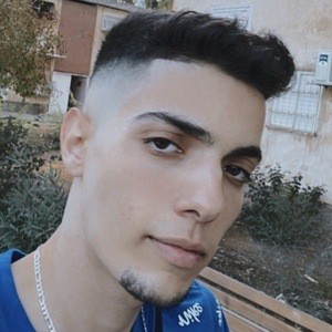 Asher Migirov Headshot 3 of 10