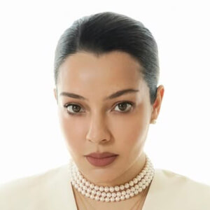 Dënis Colak-Taylor Headshot 6 of 9