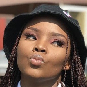 mpho pink Headshot 6 of 10