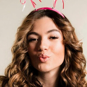 Romi Pavlinec Headshot 6 of 7
